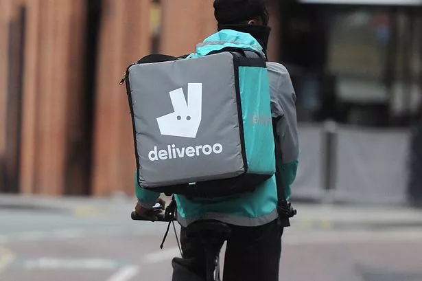 Deliveroo swings to first full year profit as orders jump in UK and Ireland