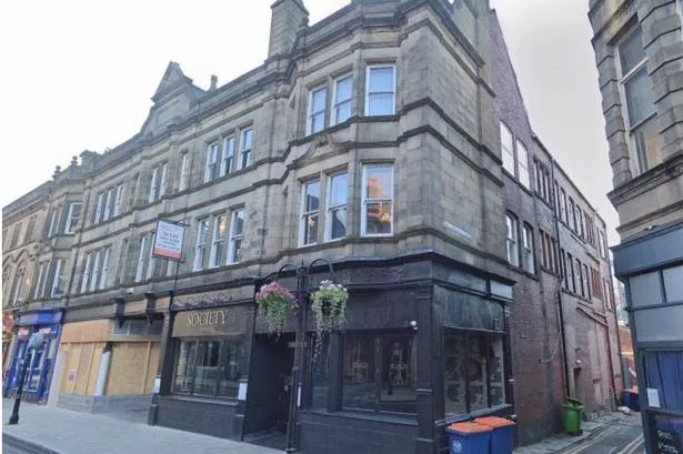 Office block above night time 'strip' set to be transformed into 14 flats